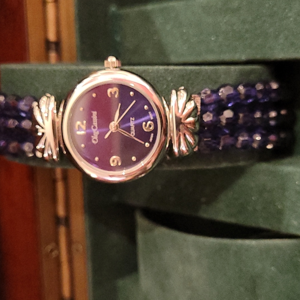 Oleg Cassini Ladies Wrist Watch. Blue Beaded Band